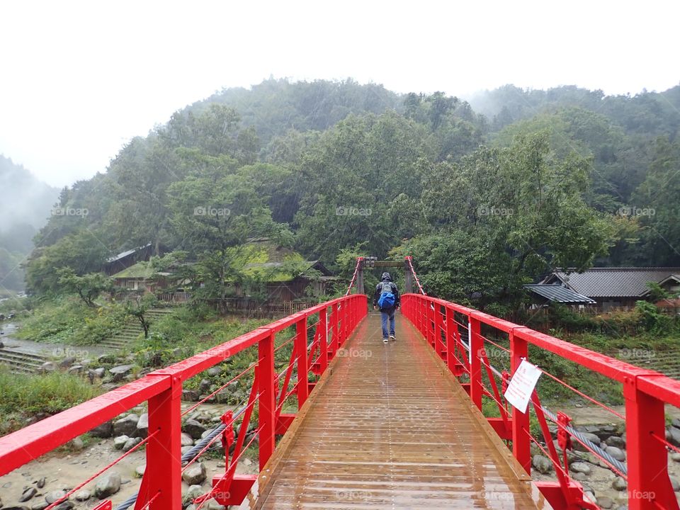 Crossing red bridge