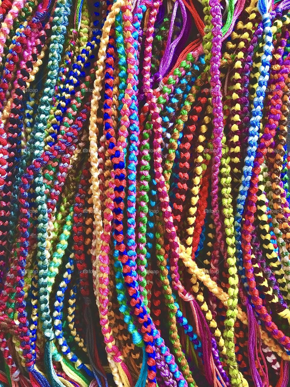 Colorful handmade bracelets, bracelets made by hand with string, crafting bracelets for kids