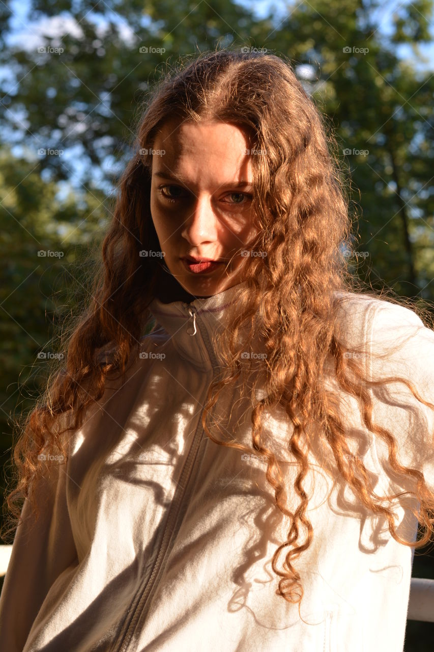 girl beautiful portrait close up in the sunlight