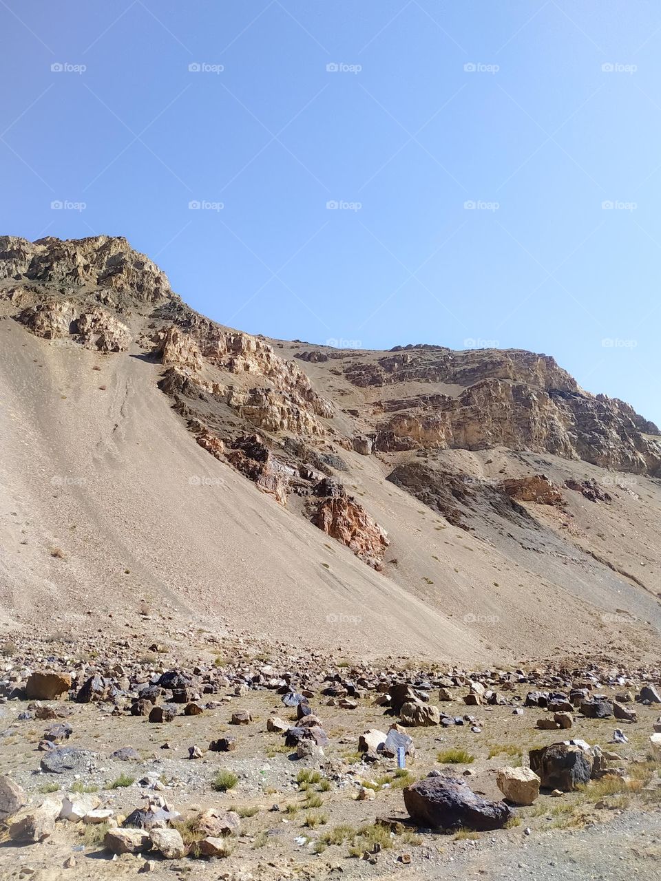 amazing view of stones mountain on blue sky background