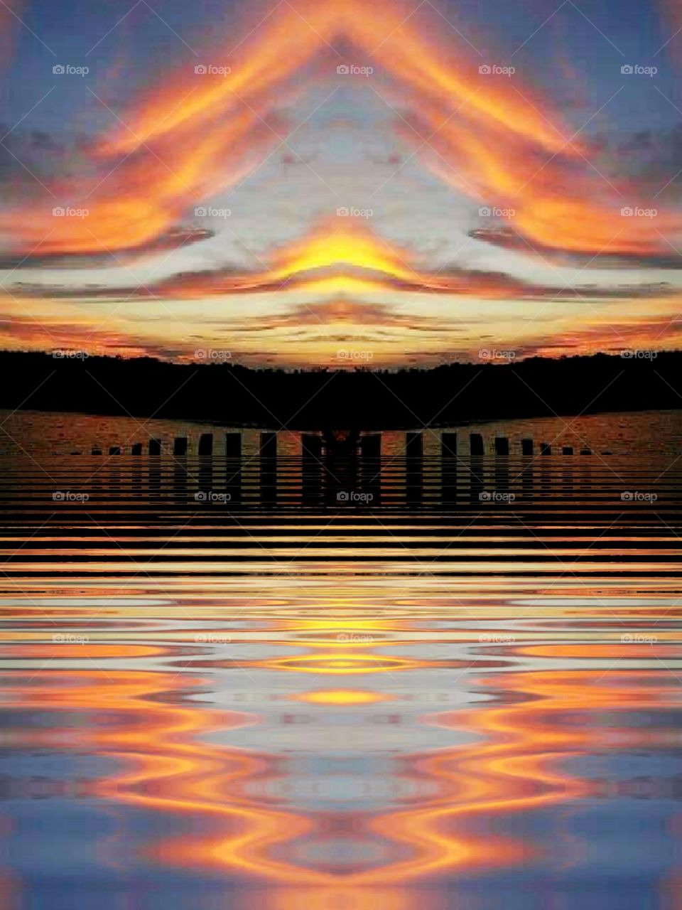 mirrored and rippled sunset over salt marsh