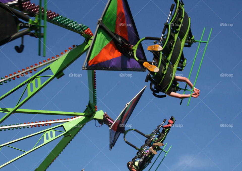 Flying High. Summertime small town fair ride