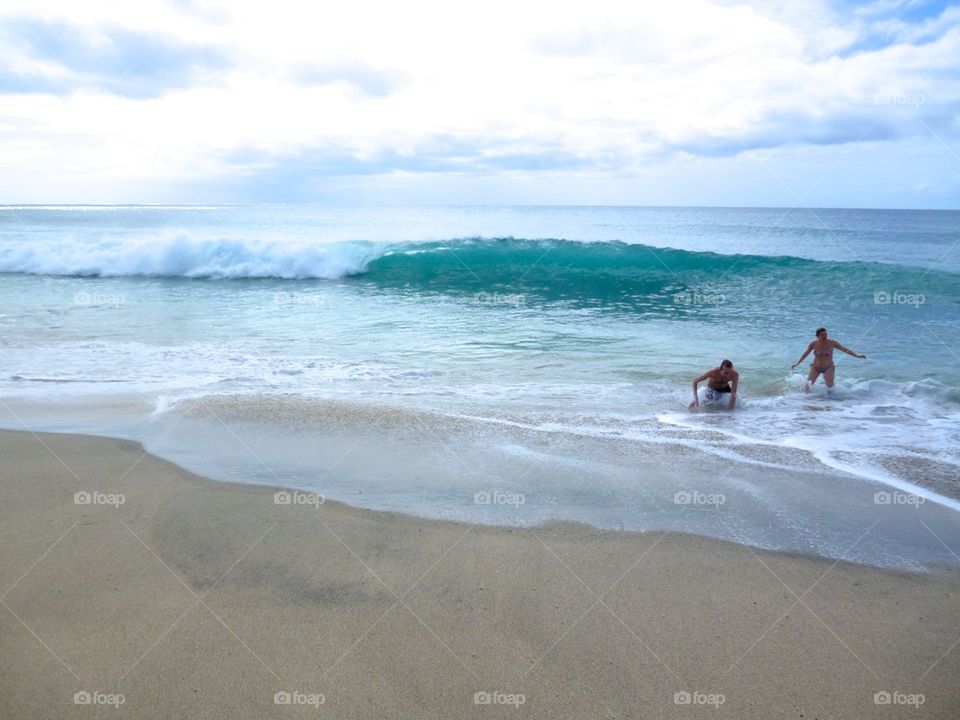 Swimming in the waves