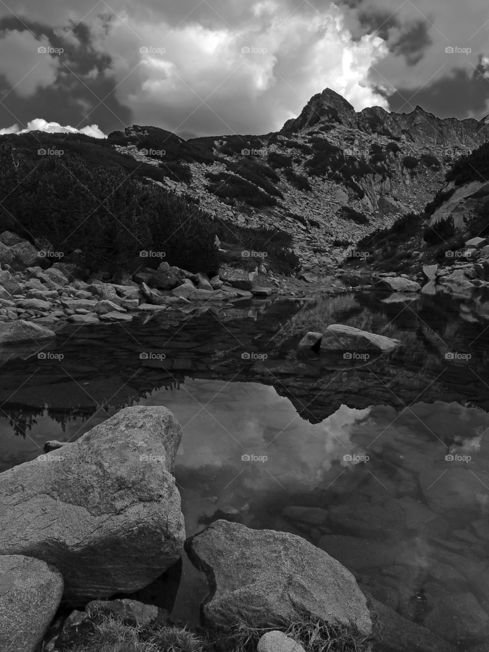 Black and white view of mountain lake