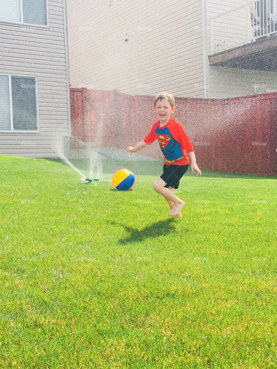 Every kid needs to run through a sprinkler 