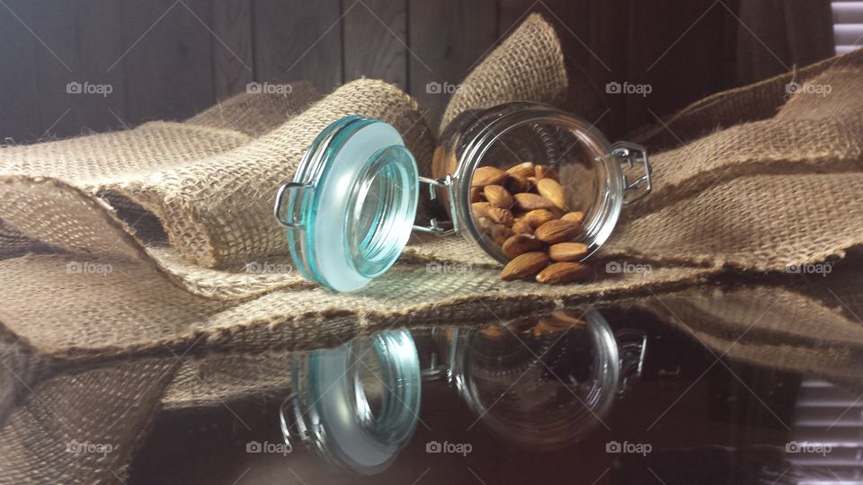 almond inside a glass container
