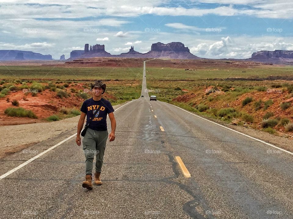 Man walking on road