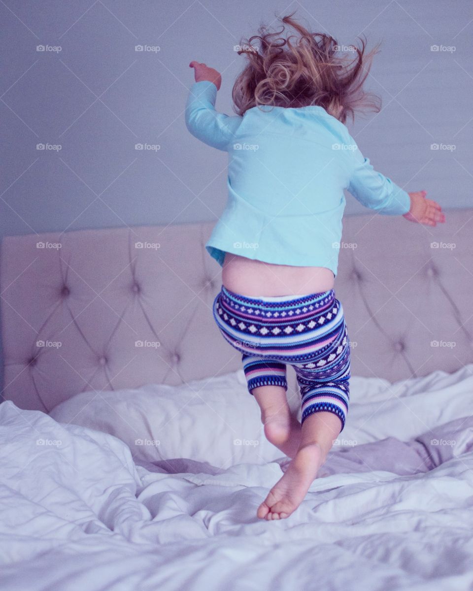 One little monkey jumping on the bed