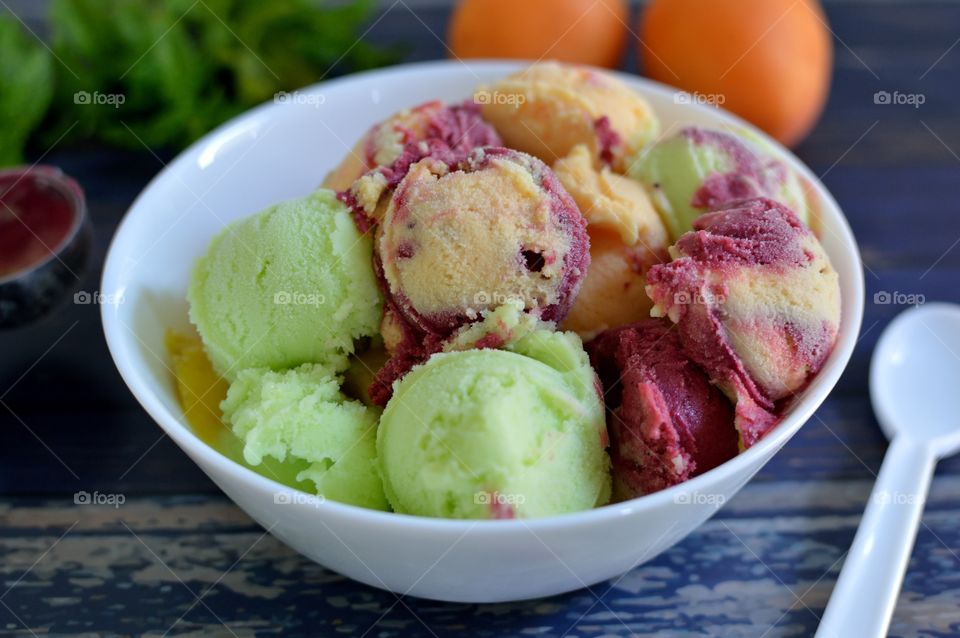 Scoop of ice cream in bowl