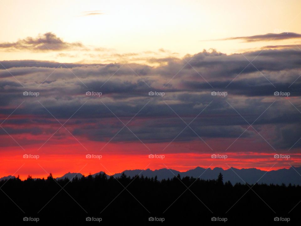 Red Horizon over Olympic Mountains