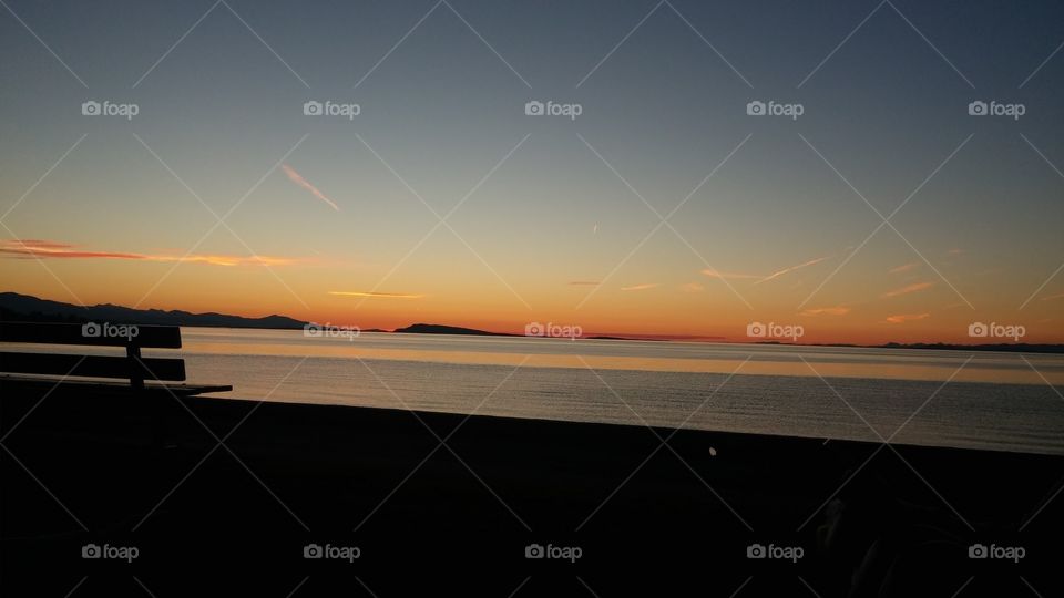 Beautiful orange sunset off Qualicum Beach in BC