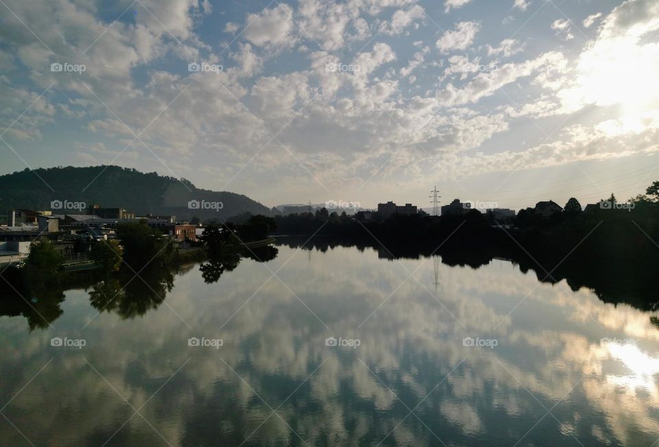 Beautiful scenery with sky reflected in water at Austria