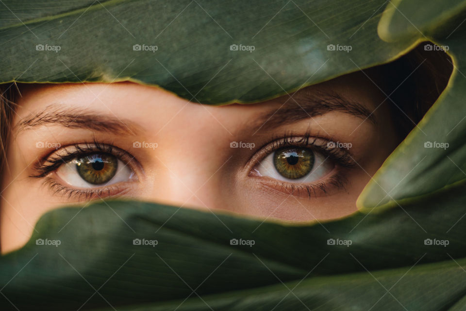 Close up on a girl's green eyes