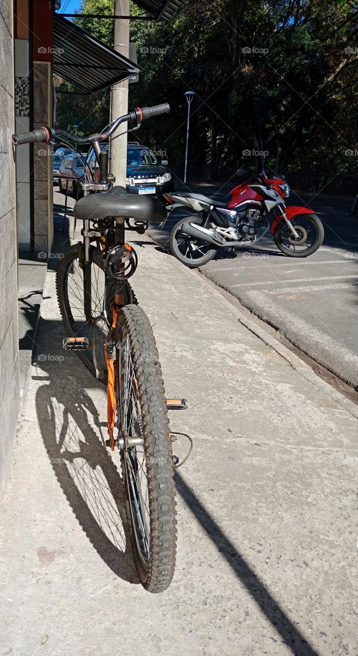 A bicycle on a sidewalk