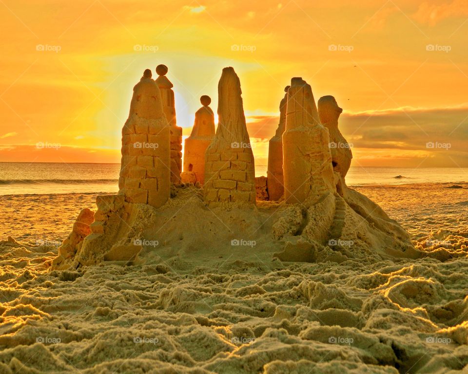 Sandcastle on the Gulf of Mexico, flanked by a marvelous sunset.