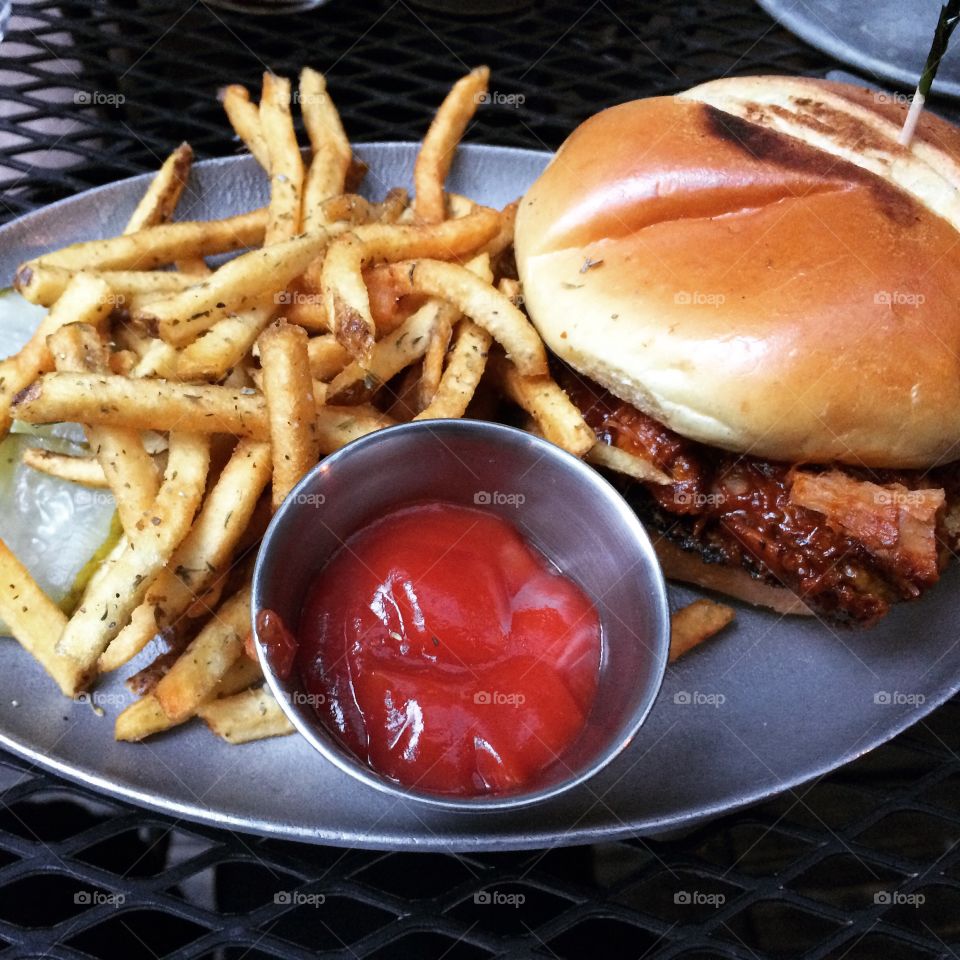 Pulled Pork and Fries. Dinner at a New Orleans style bar in NYC's East Village 