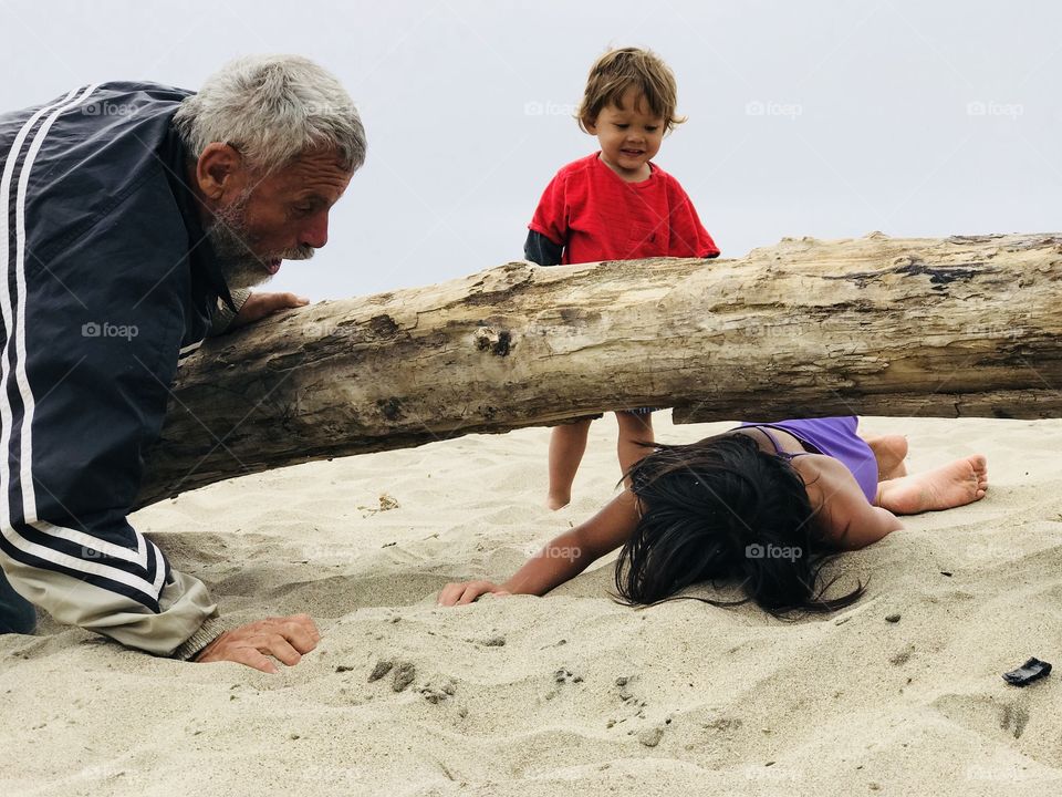 Awesome memories! Crawling under a log at the beach