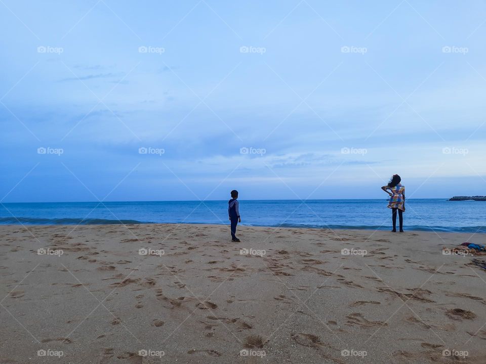 Minimalism  -  kids on a beach