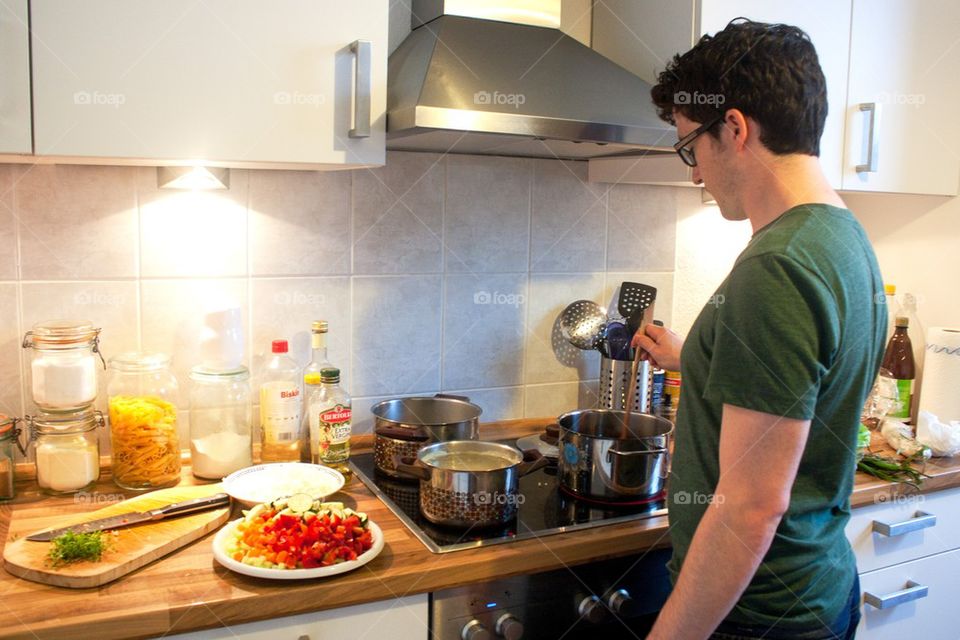 Husband cooking dinner