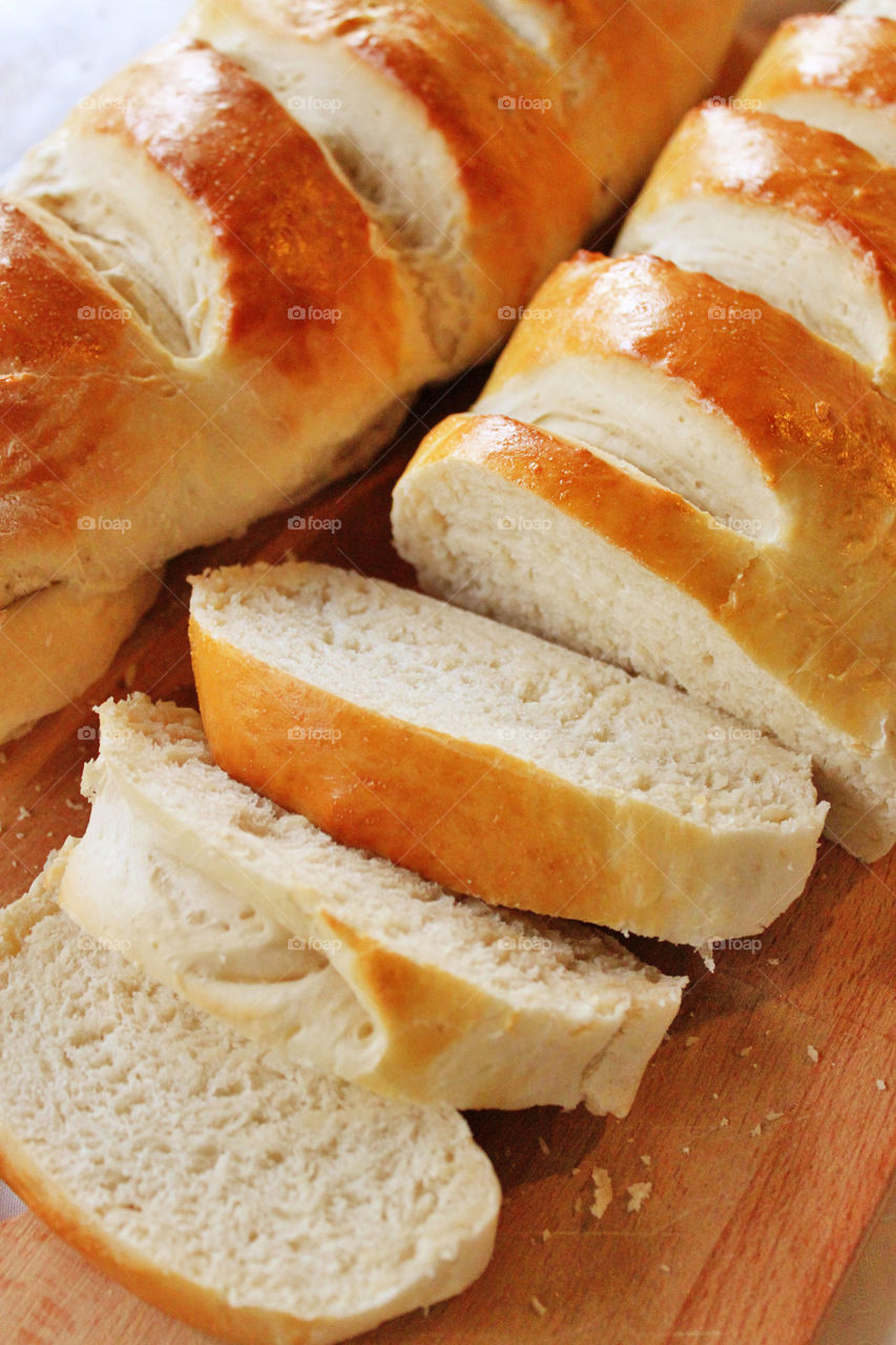 Bread slice on wooden tray