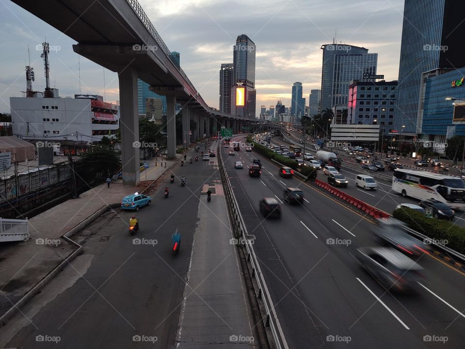 traffic in the city of Jakarta in the late afternoon