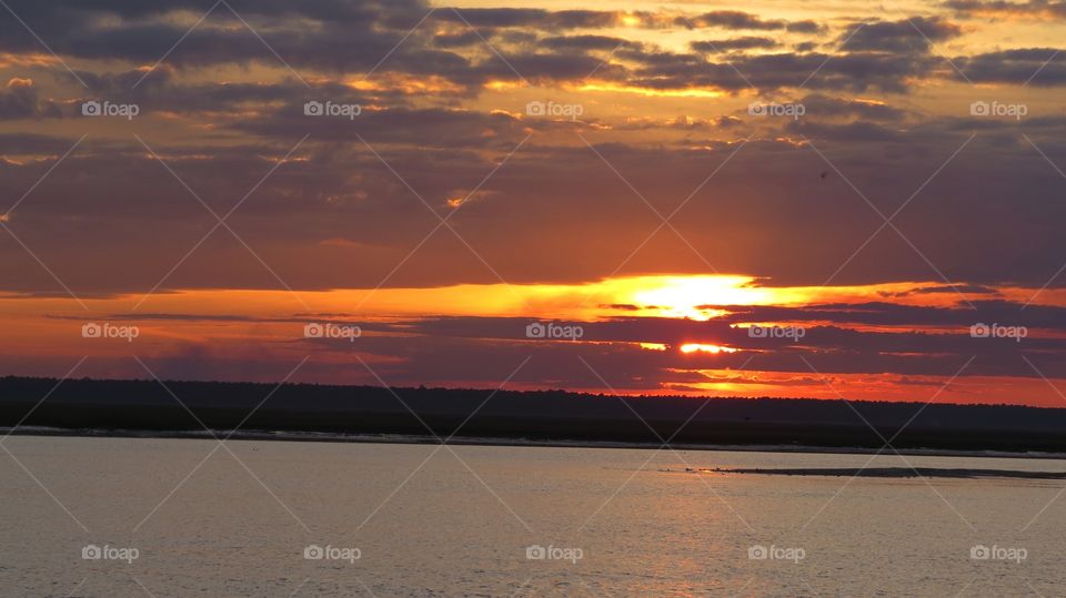 Sunset over the water