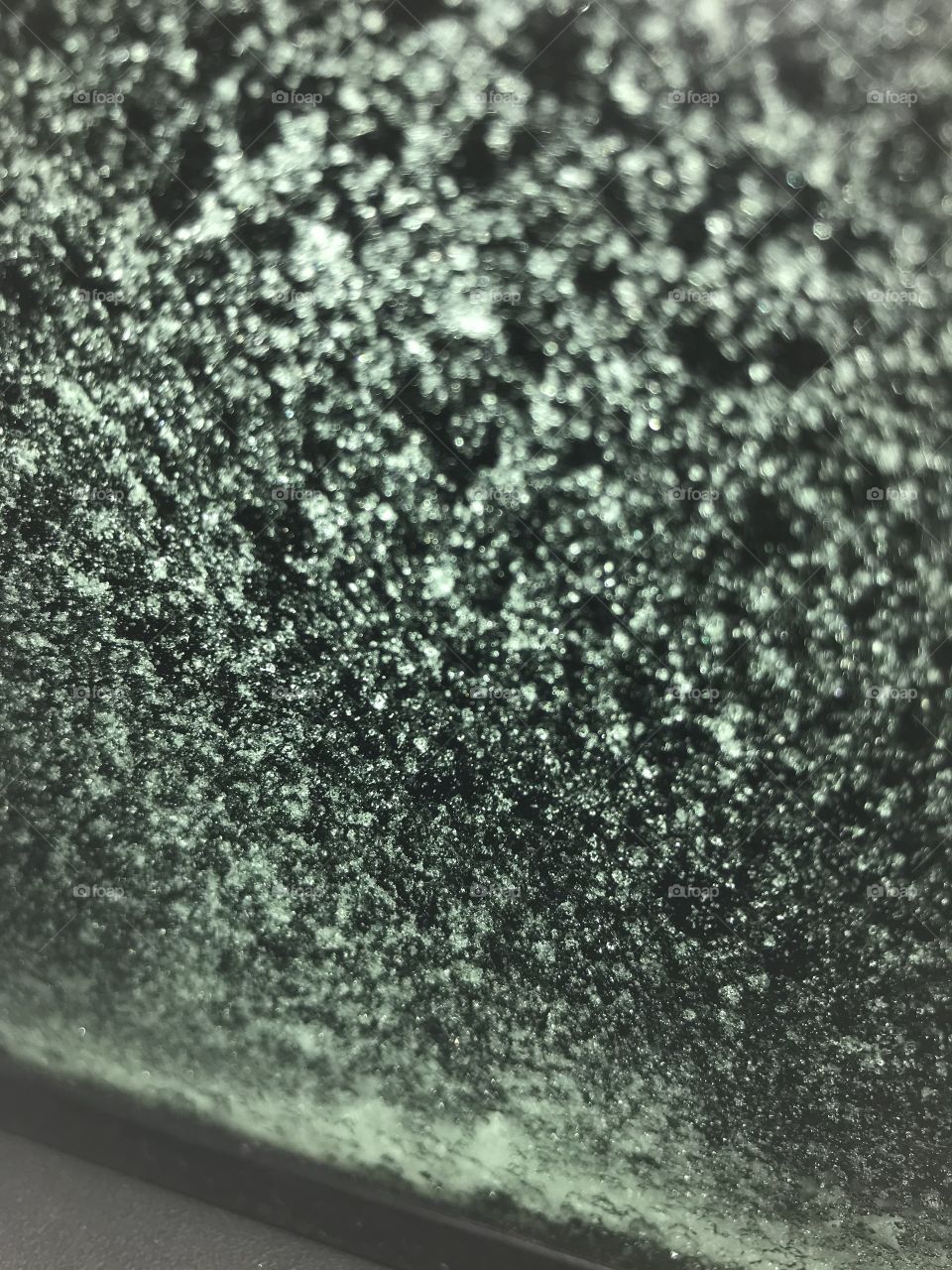 Frost on a car window in Norway.                                                  