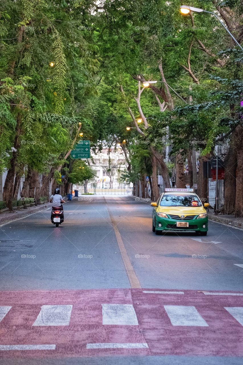 Motorcycle  and Taxi
