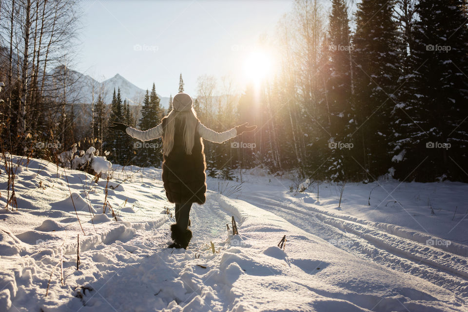 girl in the snow forest