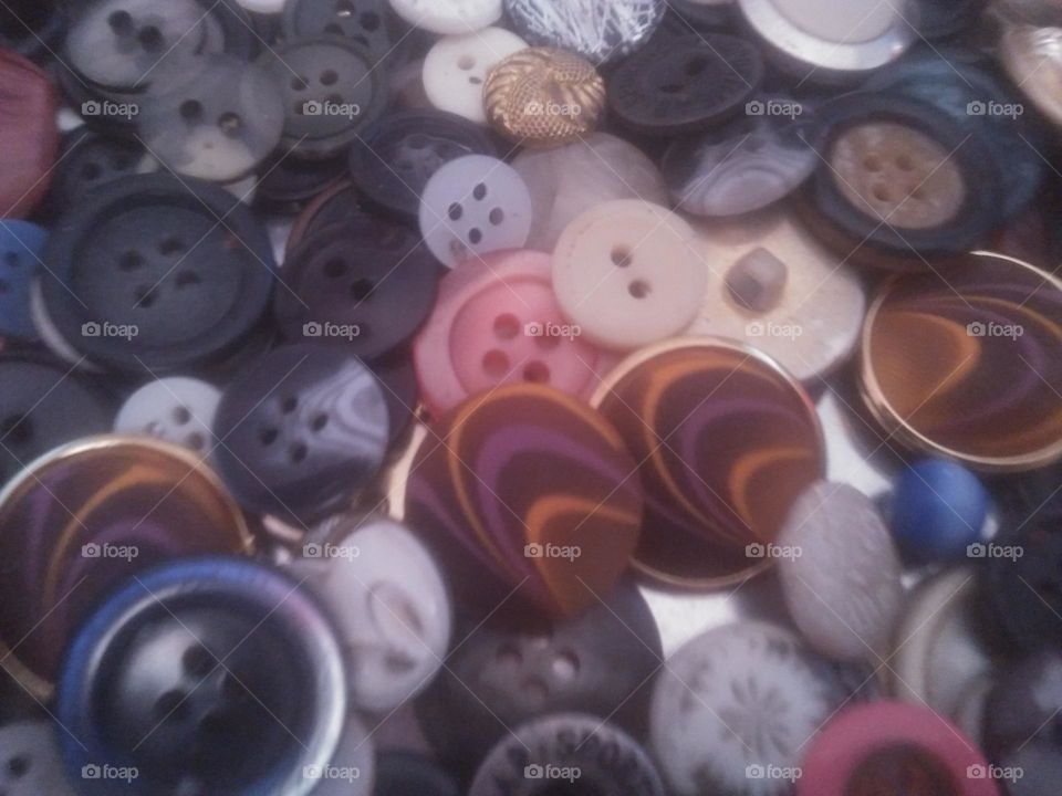  buttons  of pants and shirt.