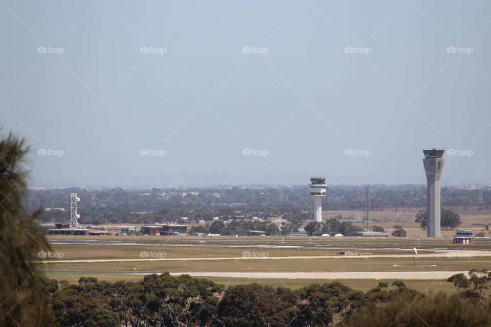 View from a hill of airport towers