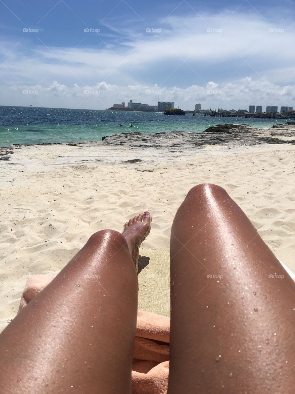 In the sun and on the beach.