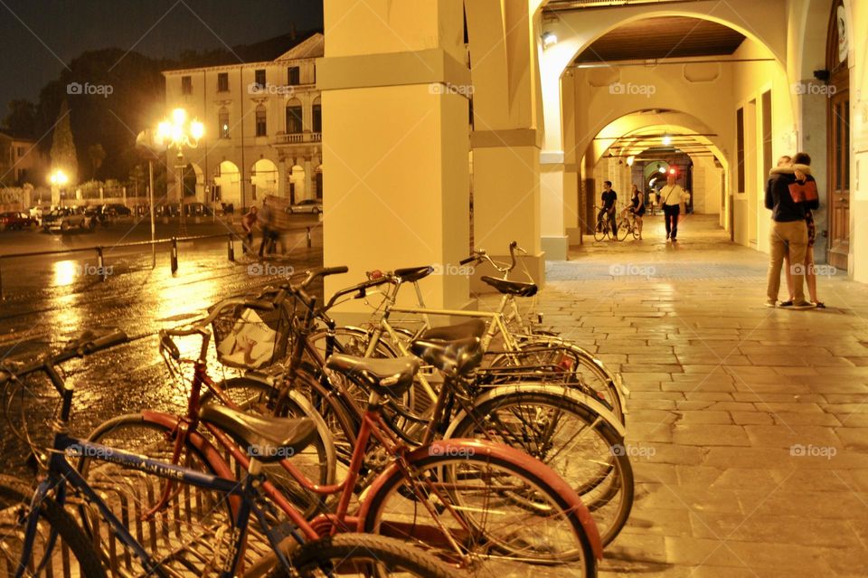 Arcades in Prato della Valle, Padua, Italy, at night; street photography, night life, night city life 