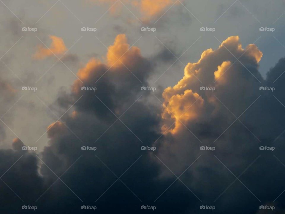 Clouds and Sun and storm