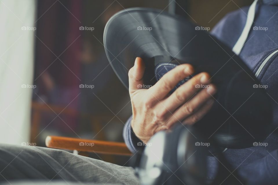 Vinyl record in hands