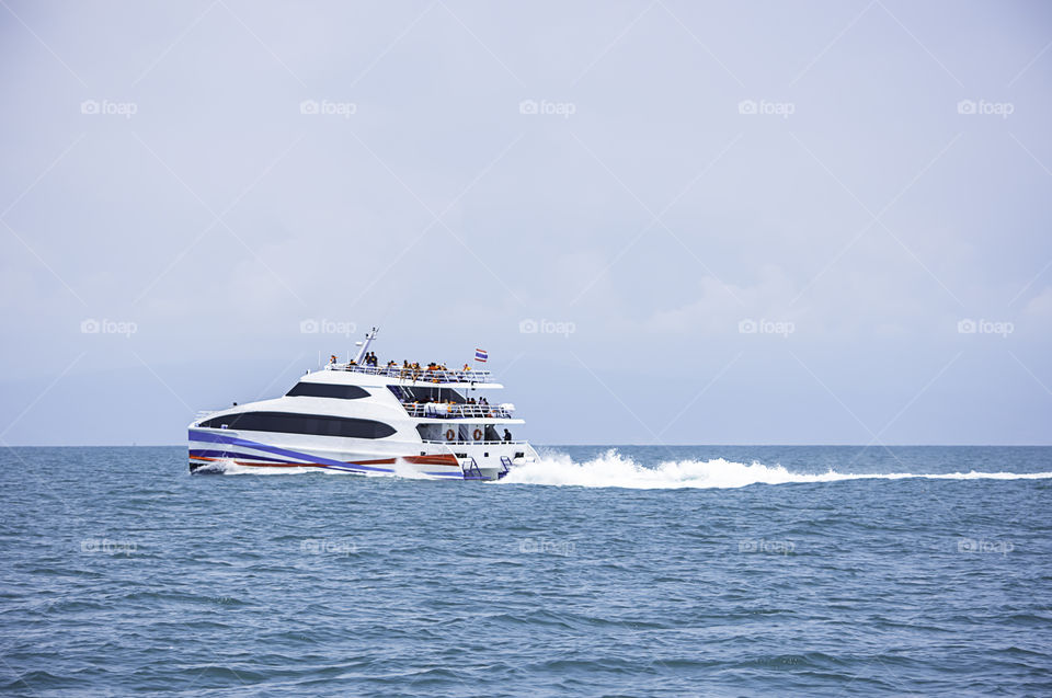 ferry boats transfers visitors in the sea at Koh Kood, Trat in Thailand. March 28, 2019