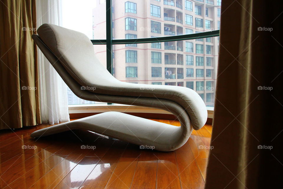 comfy chair with a view. A chair with a nice view on the city of shanghai china.