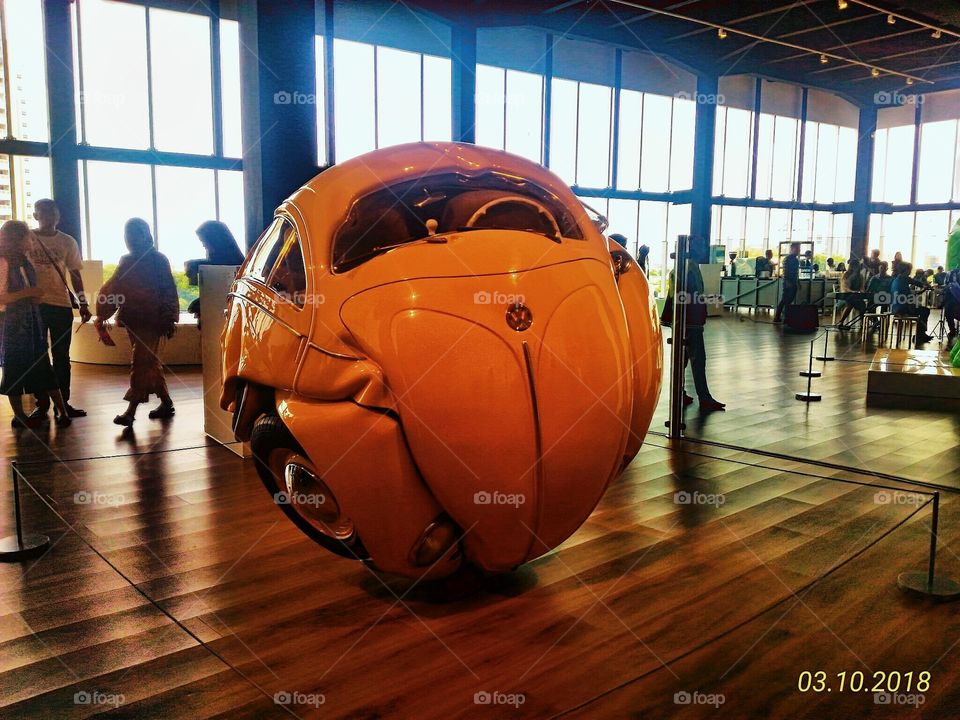 This is an original car that is formed into a round that resembles a large iron ball