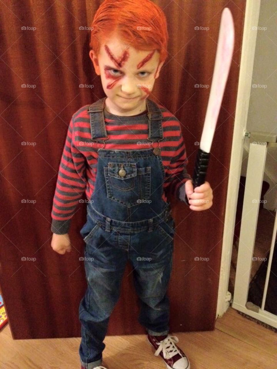 Boy dressed as Chucky for Halloween 