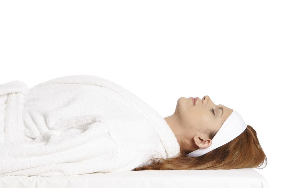 Woman relaxing in spa bed