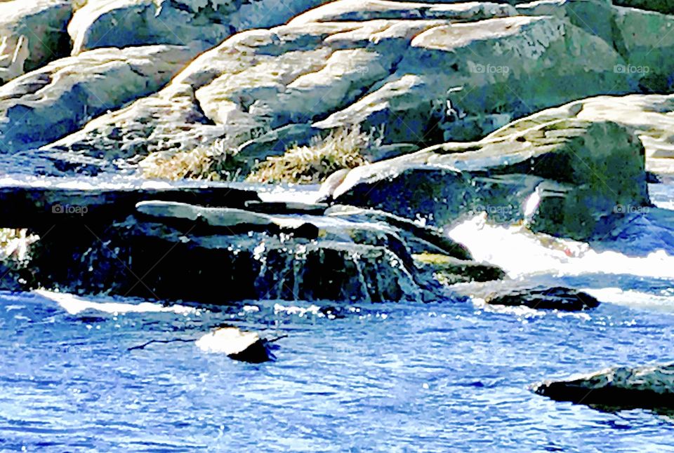 Water Flowing Over Rock