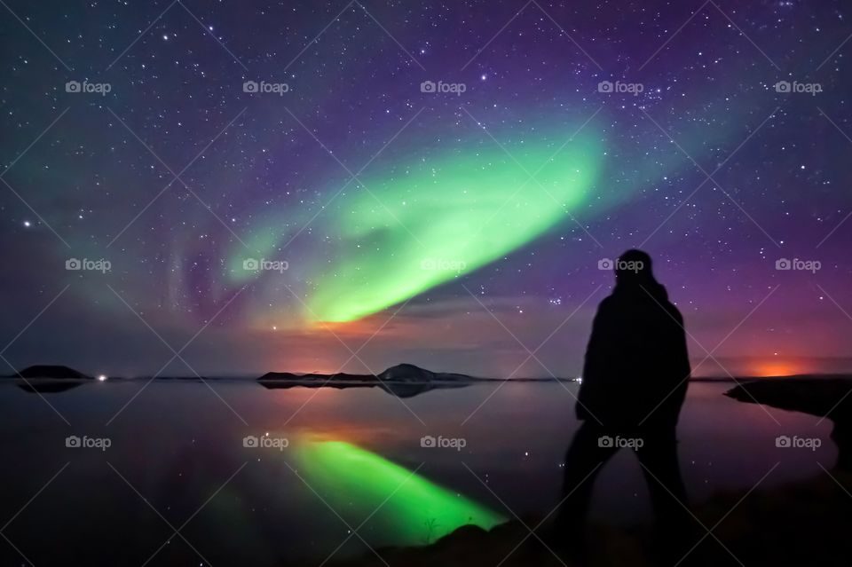 A view like from another world. The beautiful Northern lights captured at the lake Myvatn in Iceland