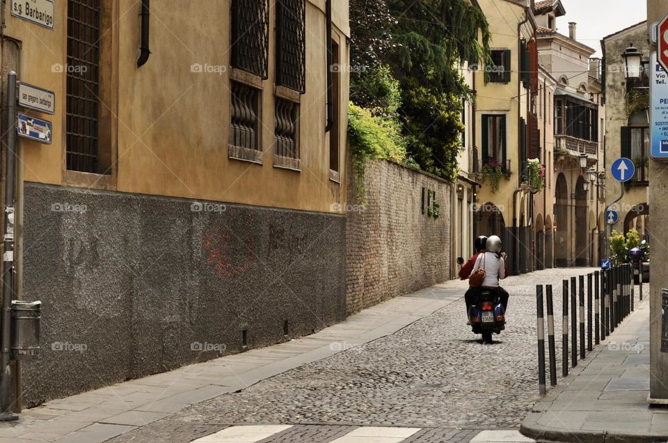 Riding a motorcycle in the city 