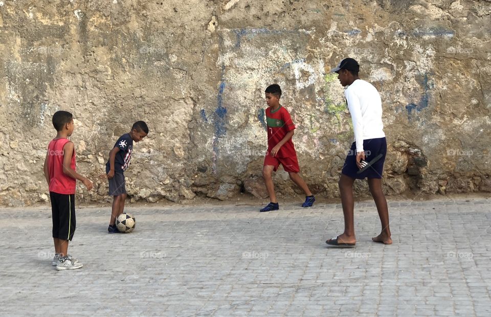 Kids playing football 