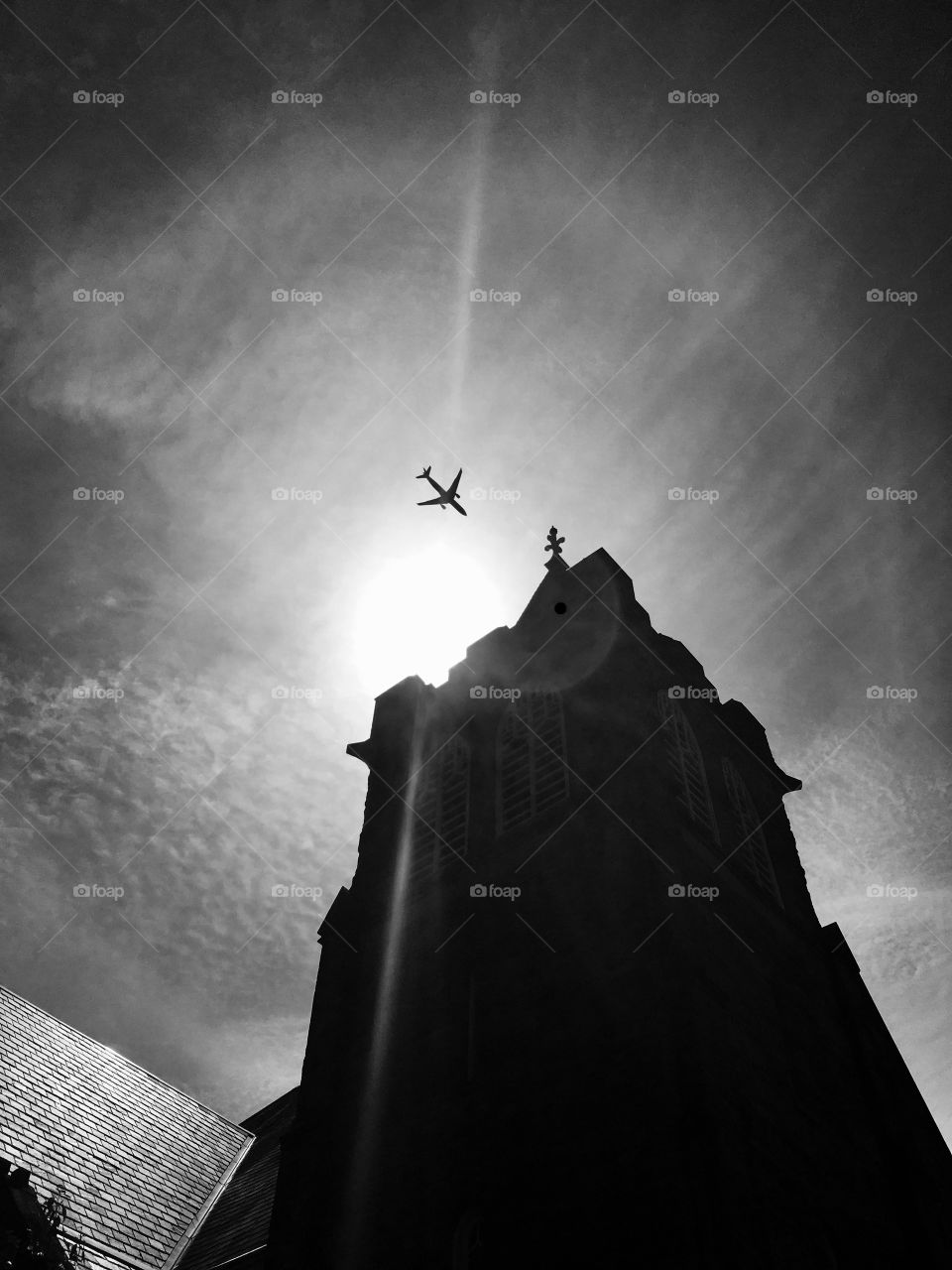 Church and aircraft passing 