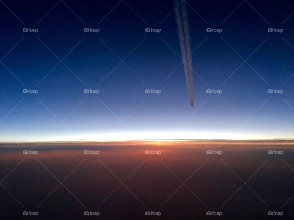 Sunrise and contrails over England 