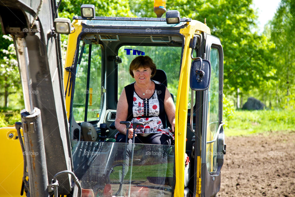 Woman in an excavator