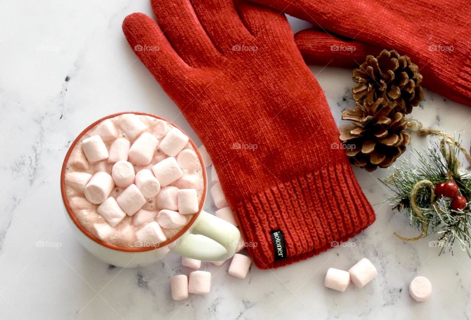 Hot chocolate with pink marshmallows winter theme