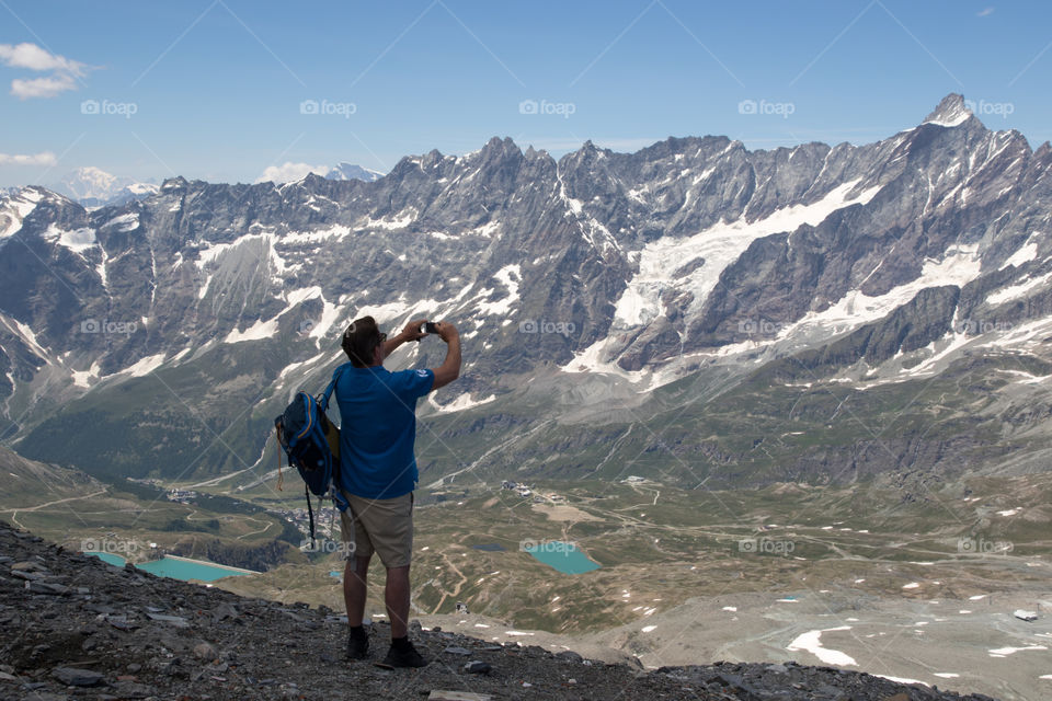 Hiking in the Alps on high altitude in Cervinia Italy 
