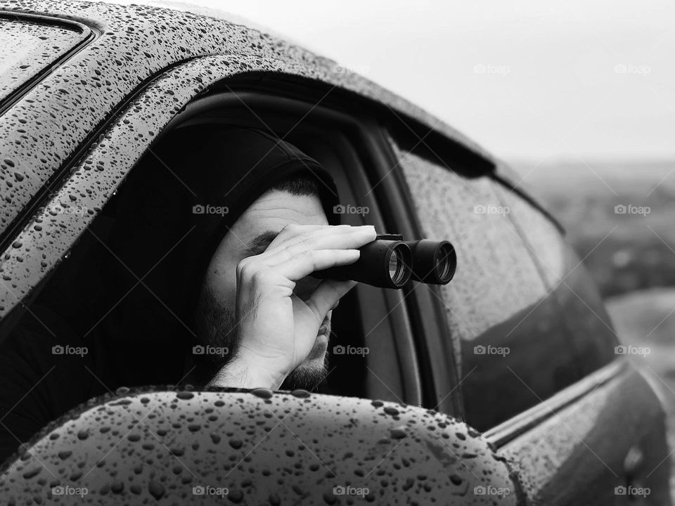 Watching through binoculars 